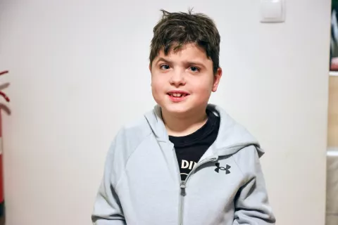 Matic Žontar na Florido danes potuje skupaj z mamo Živo in očetom Tadejem. / Foto: Tina Dokl