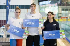 Najbolj&scaron;i trije v skupnem se&scaron;tevku Velike nagrade Slovenije v plavanju (od leve): Sa&scaron;o Bo&scaron;kan in Tina Čelik / Foto: Peter Ko&scaron;enina