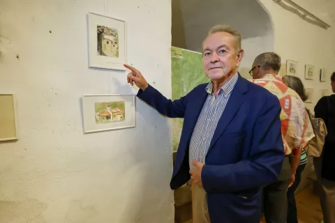 odprtje razstava avtor Pierluigi Banchig naslov razstave Votivne cerkvice Nadi&scaron;kih dolin v akvarelih Crngrob galerija v Cerkev Marijinega oznanjenja na fotografiji Giorgio Banchig zgodovinar in publicist / Foto: Tina Dokl